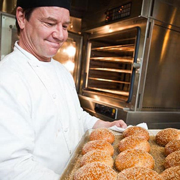 chef with fresh burger buns